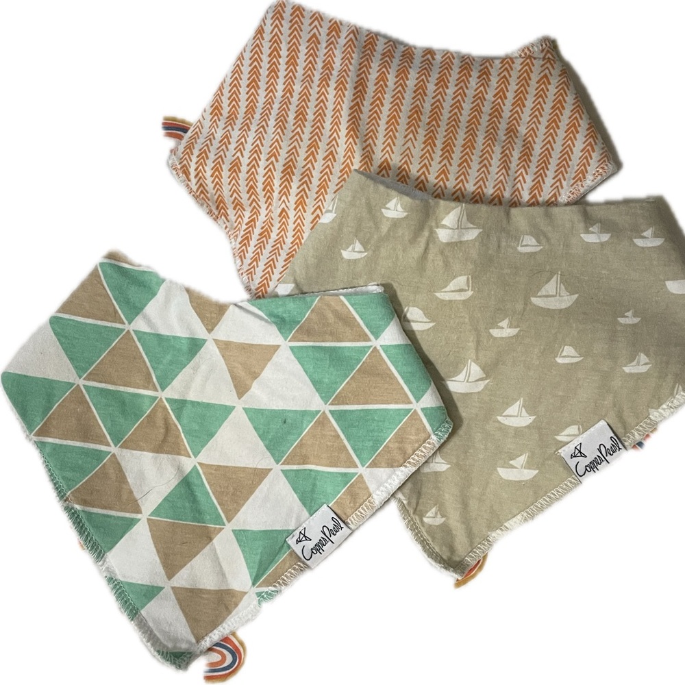 Bundle of copper pearl bibs